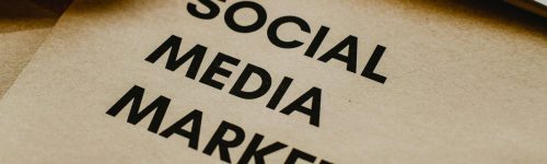 Close-up of brown envelopes with 'Social Media Marketing' text, ideal for startup themes.